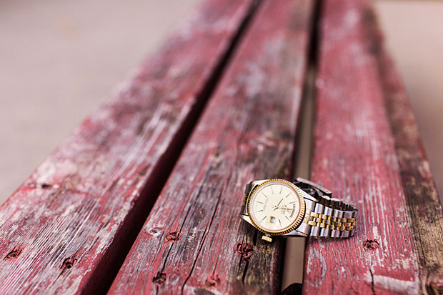 Wristwatch on picnic table - stress relief tips list and simple living resources