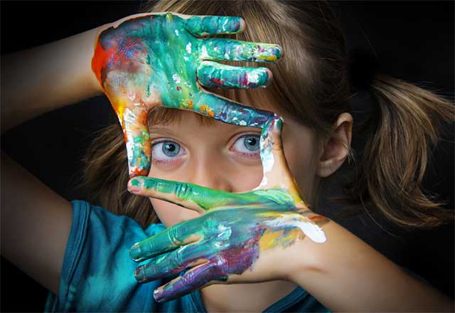 Girl with Painted Hands - Unschooling